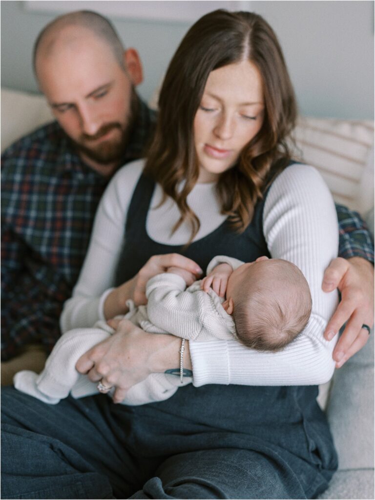 Mom, dad and baby at home