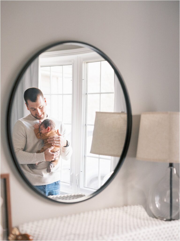 Dad holding baby