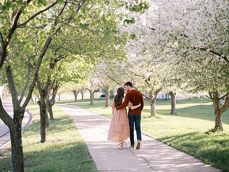 Couple with spring blossom trees