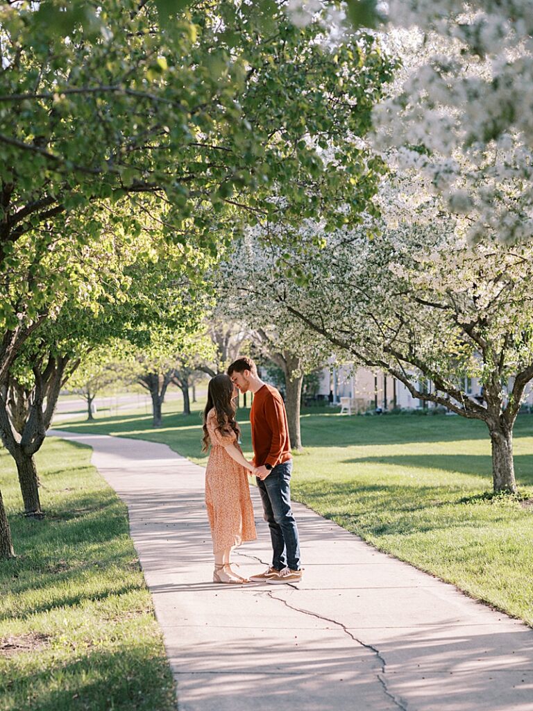 Couple with spring blossom trees