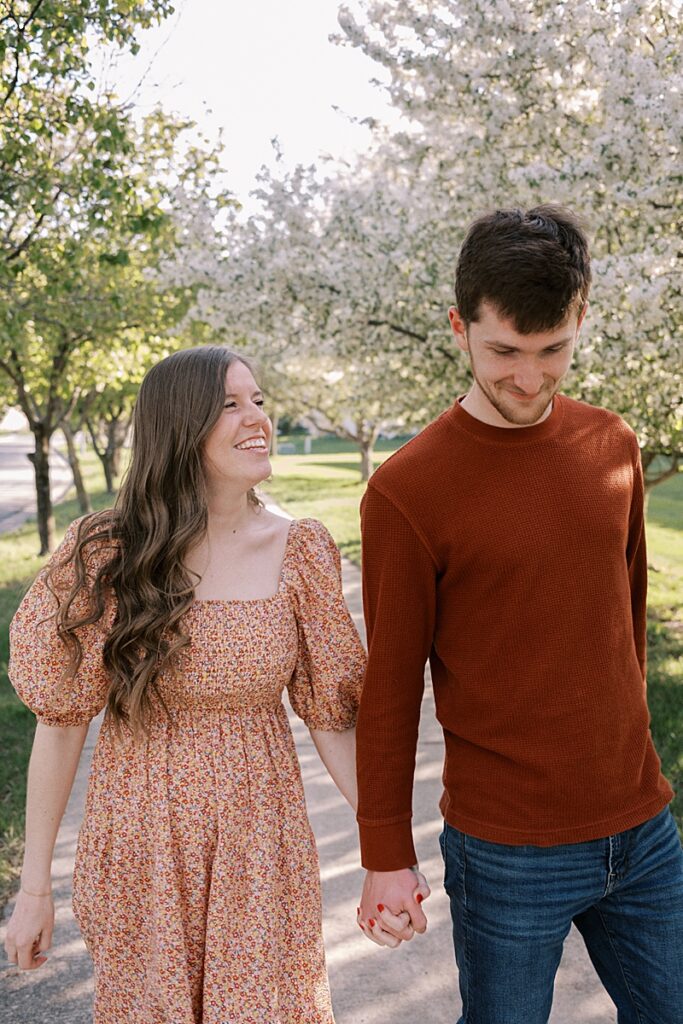 Couple with spring blossom trees