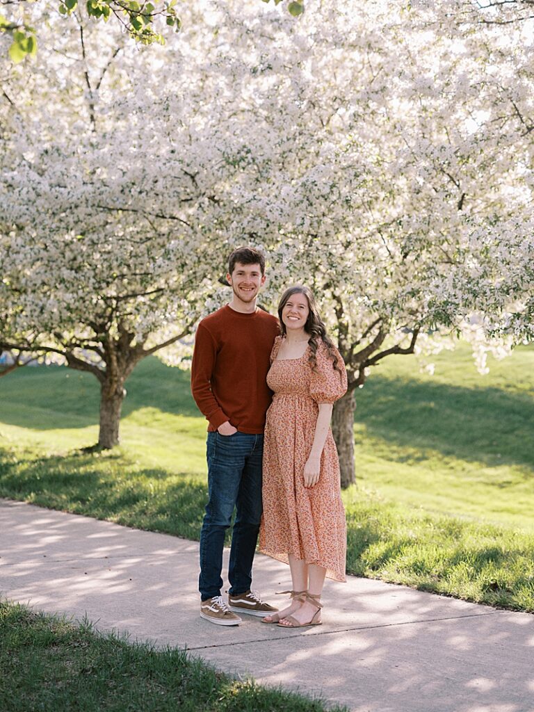 Couple with spring blossom trees