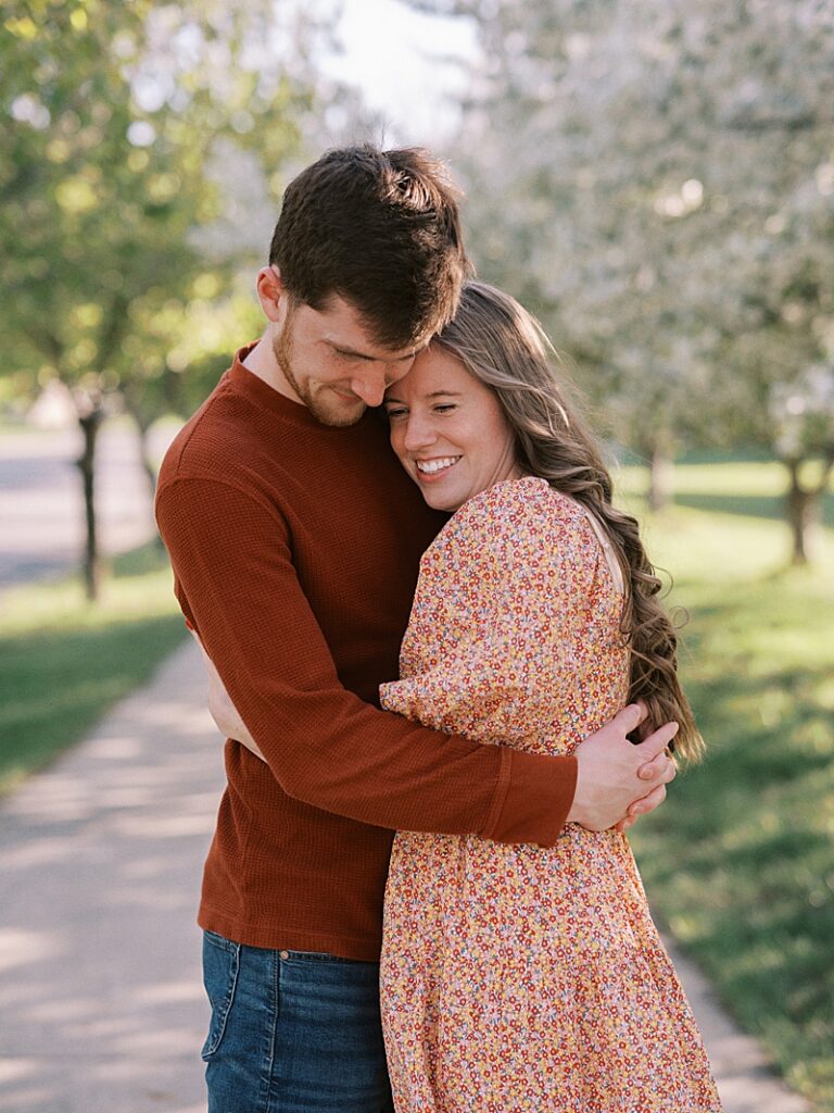 Couple with spring blossom trees