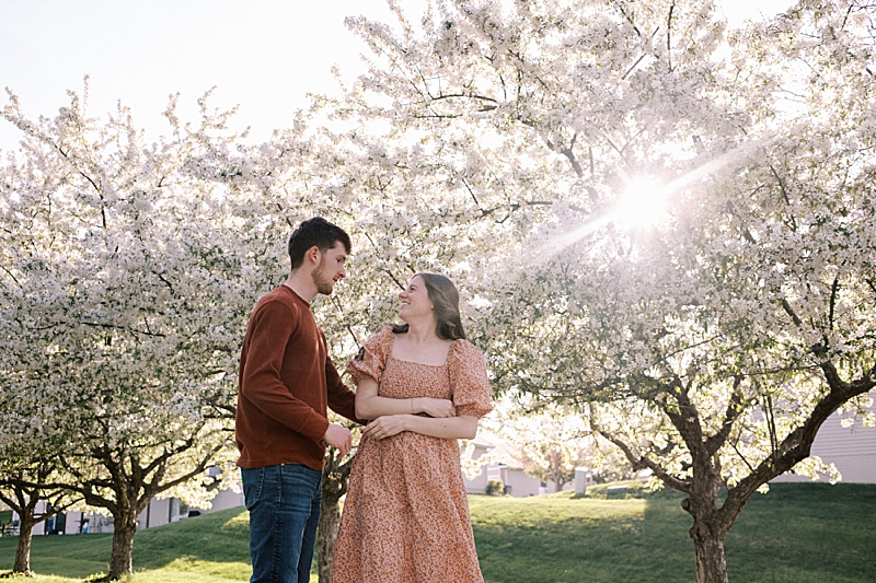 Couple with spring blossom trees