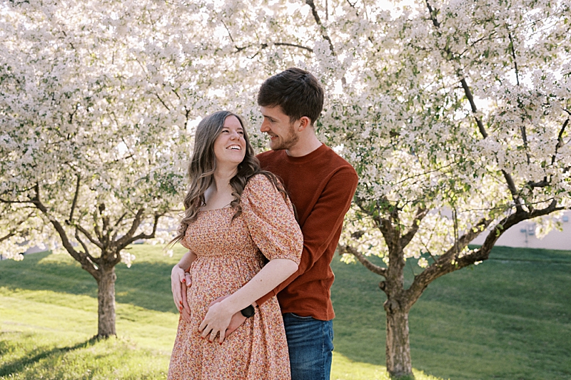 Couple with spring blossom trees