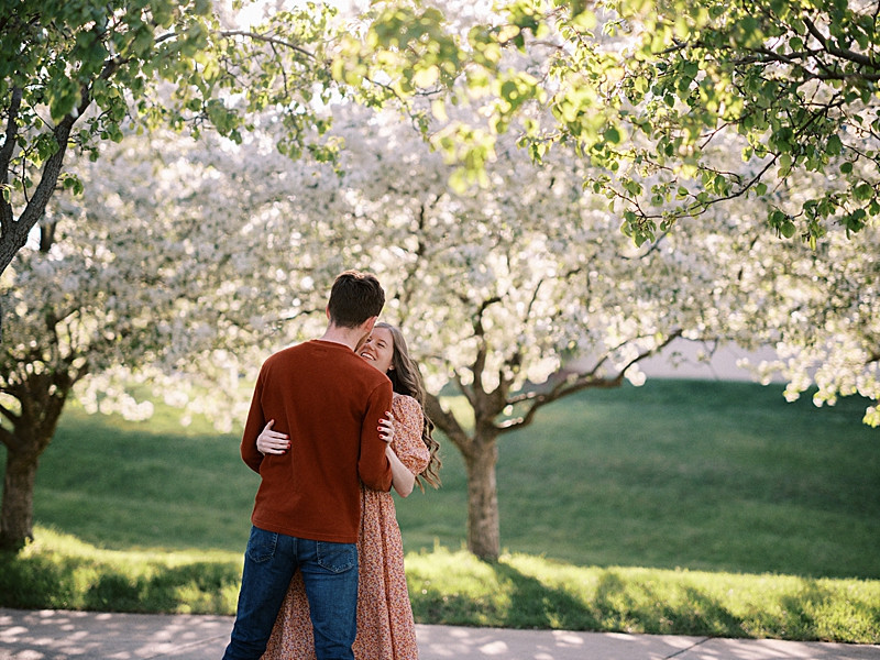 Couple with spring blossom trees