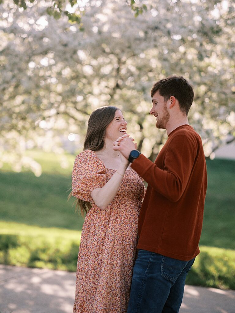 Couple with spring blossom trees