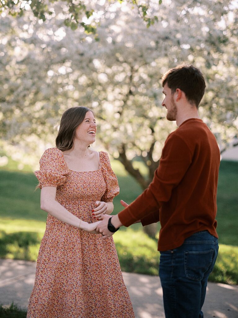 Couple with spring blossom trees