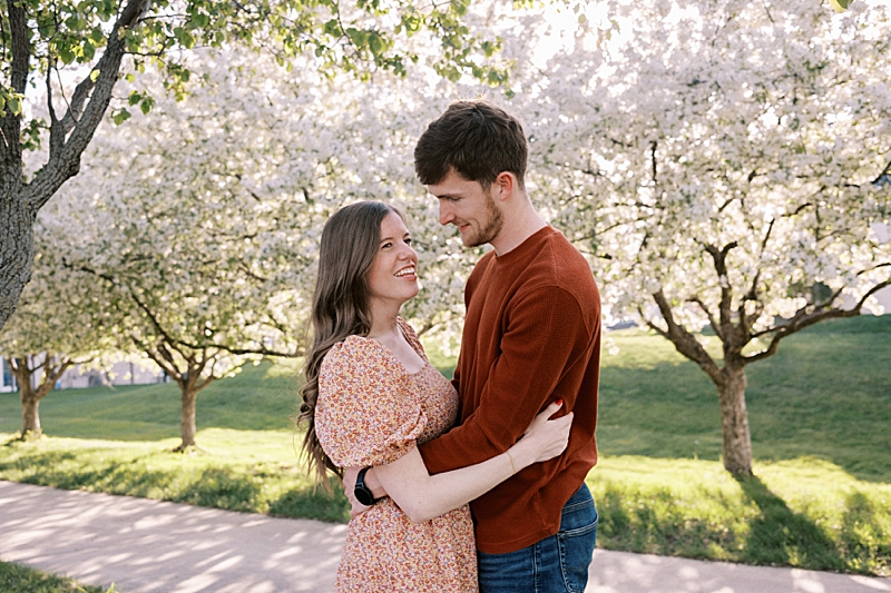 Couple with spring blossom trees