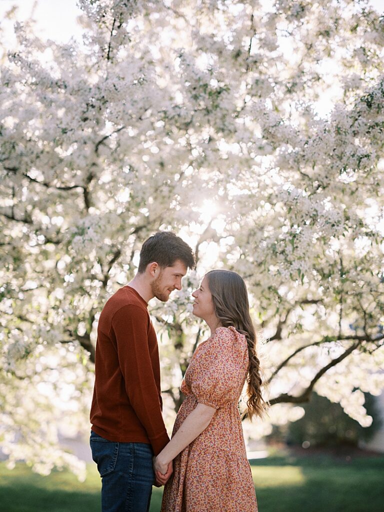 Couple with spring blossom trees