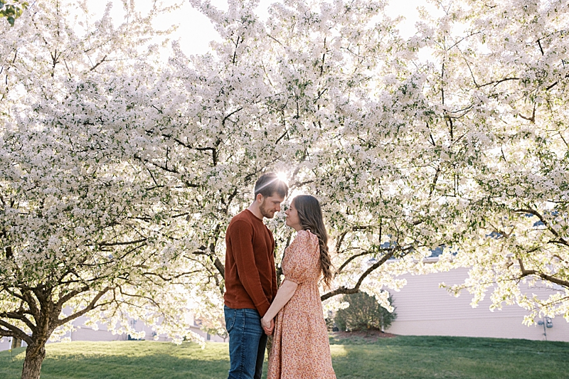 Couple with spring blossom trees