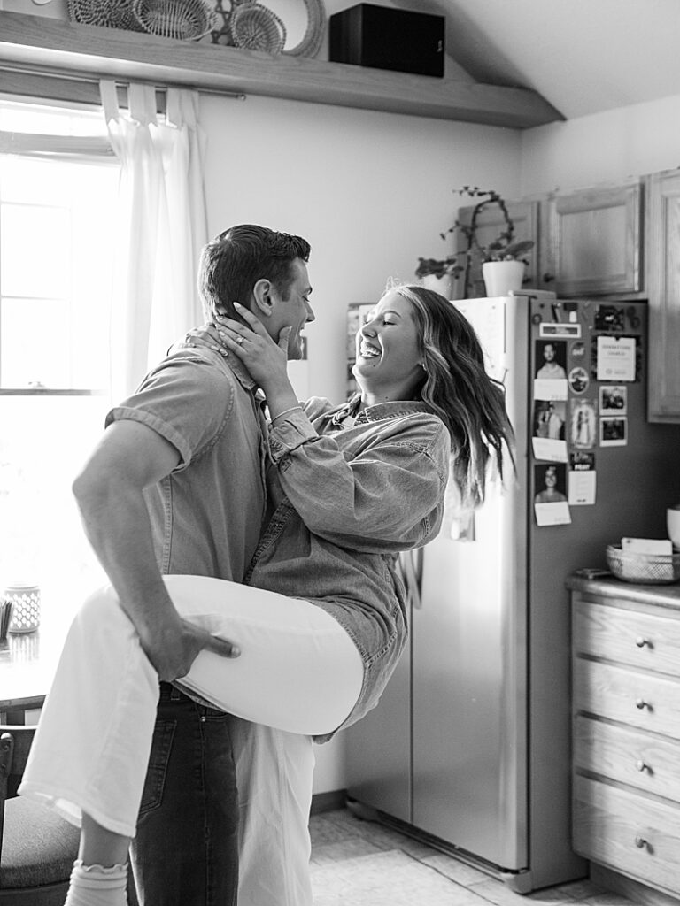 Couple dancing in their Ames apartment