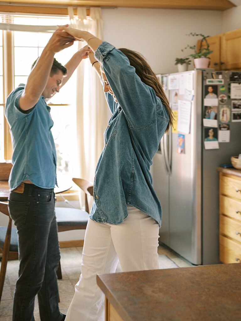 Couple dancing in their Ames apartment