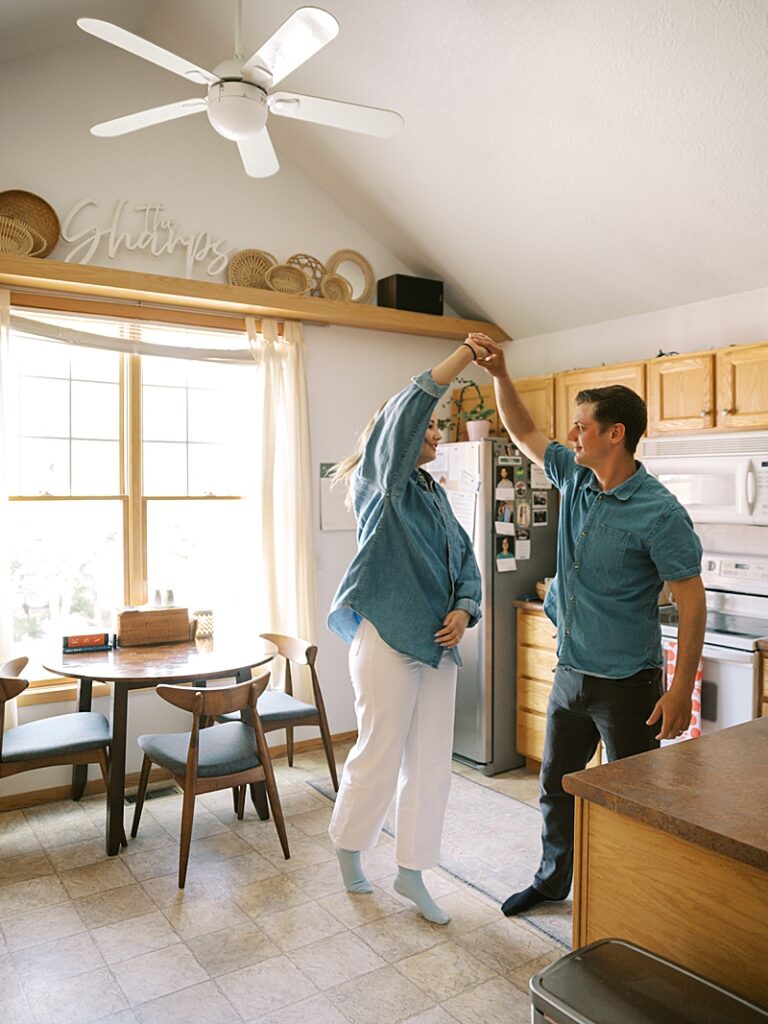 Couple dancing in their Ames apartment