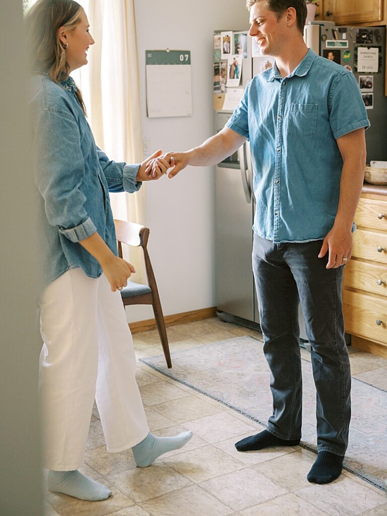 Couple dancing in their Ames apartment