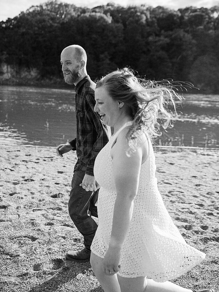 Couple running on beach at Palisades State Park