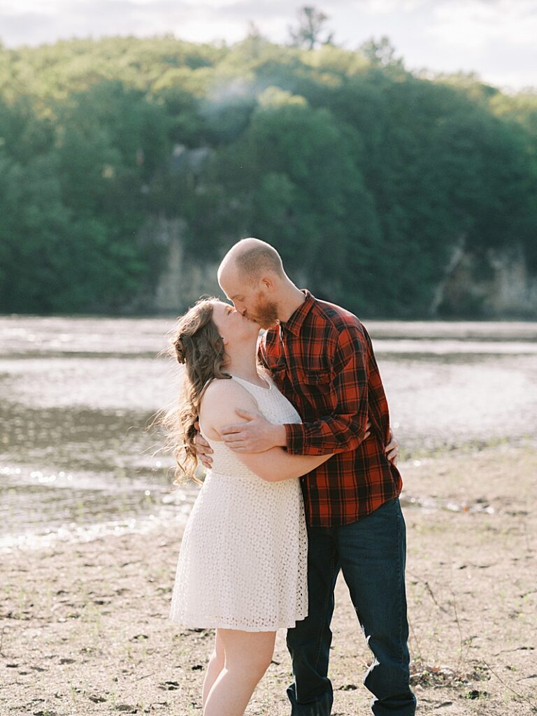 Couple kissing on the beach