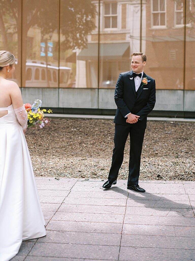 Bride and Groom first look in downtown Des Moines wedding