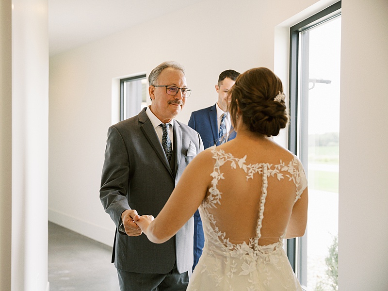 First look with bride's dad and brother at the Midnight Gem